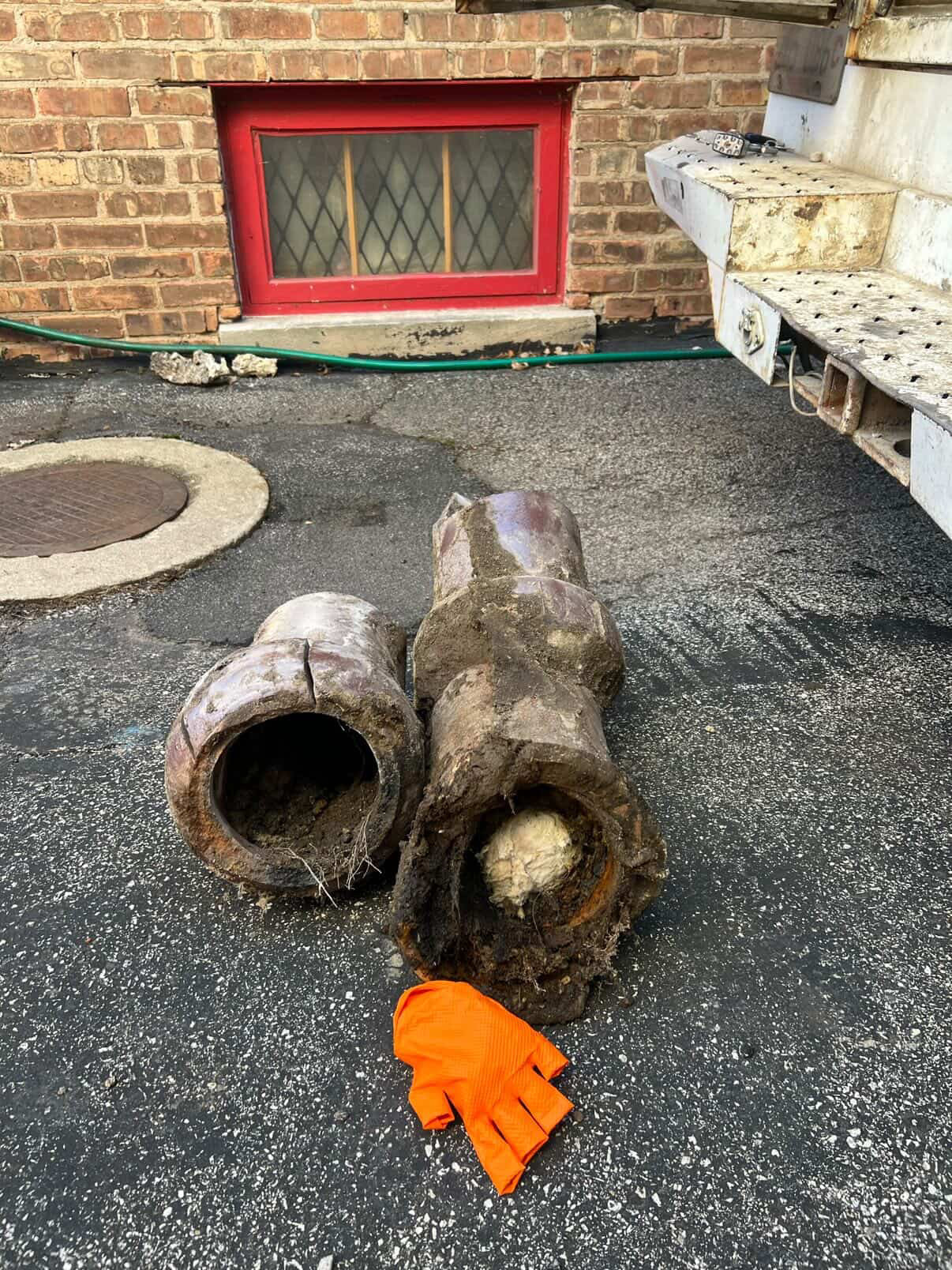 Failed clay sewer pipe sections removed from the ground
